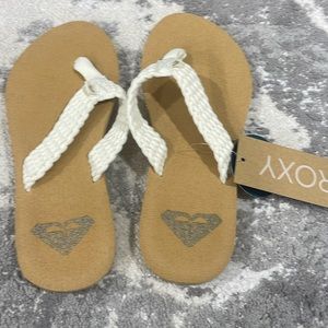 Brand new flip flops for young girls.